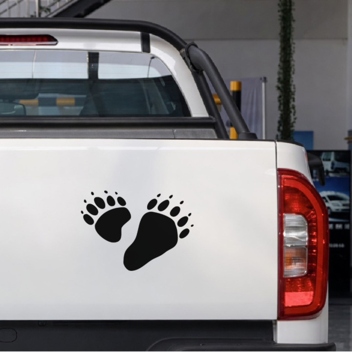 Bear Footprints sticker on a pickup tailgate