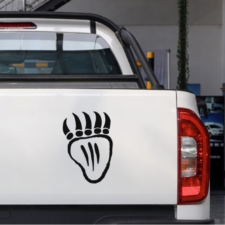 Bear Paw Scratch Marks sticker on a pickup tailgate