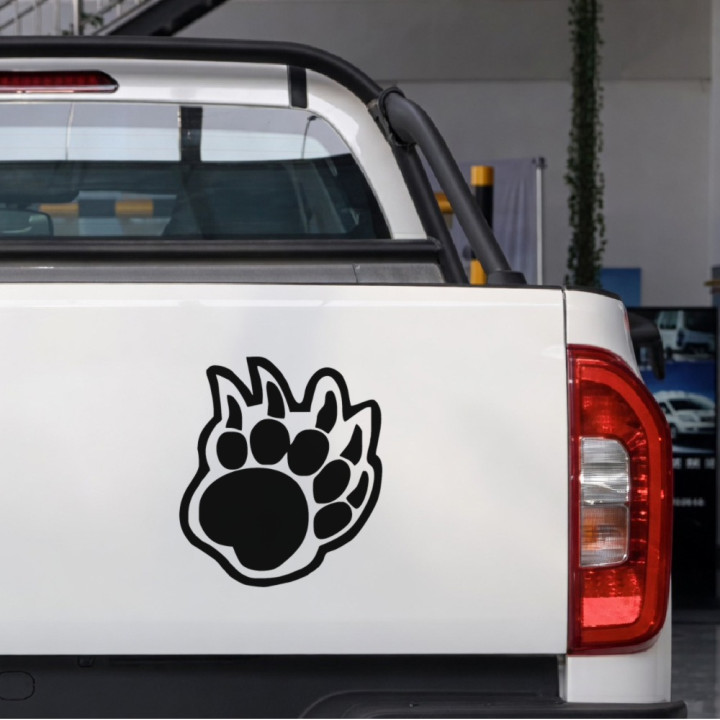 Bold Bear Paw sticker on a pickup tailgate