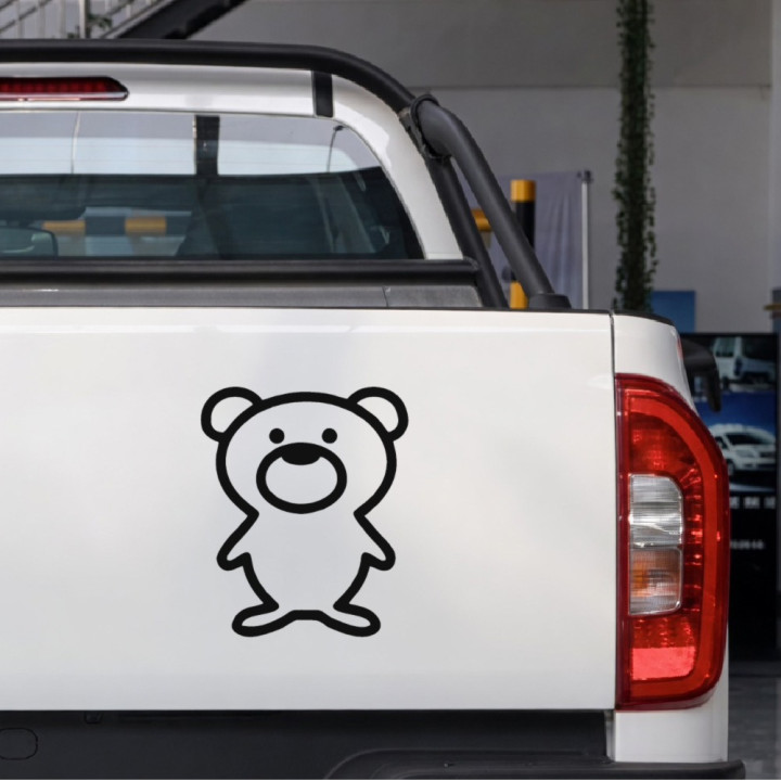 Cartoon Bear sticker on a pickup tailgate