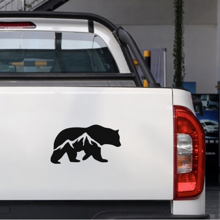 Mountain Bear sticker on a pickup tailgate