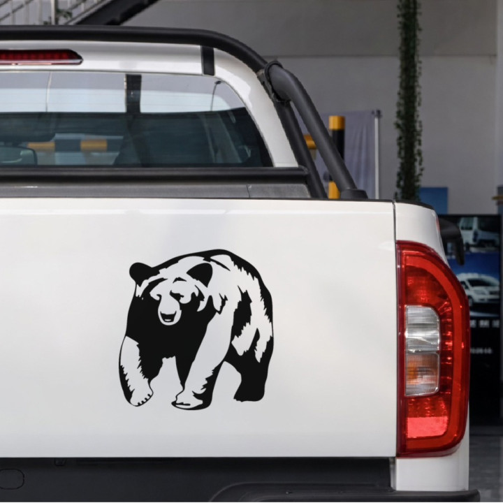 Stalking Grizzly sticker on a pickup tailgate
