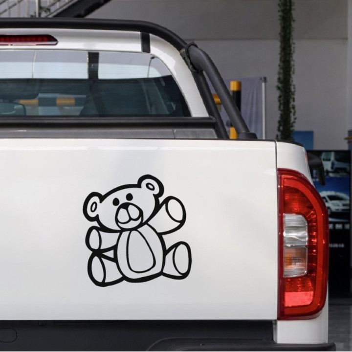 Teddy Bear sticker on a pickup tailgate